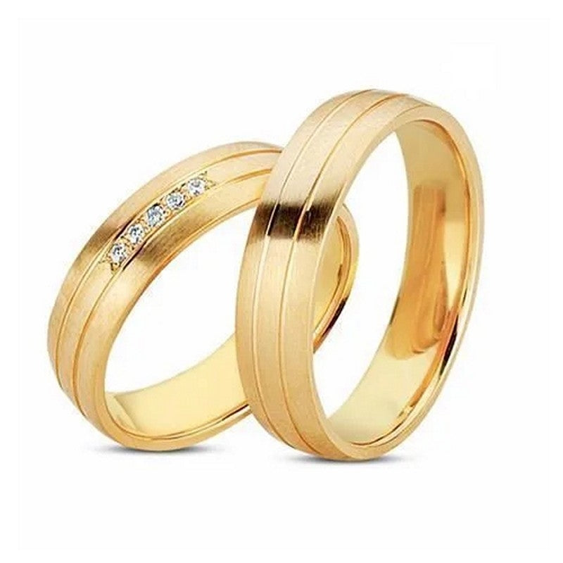 Smukke Nuran vielsesringe i 8 eller 14 karat guld med 5 x 0,01 ct diamanter i lige bånd.